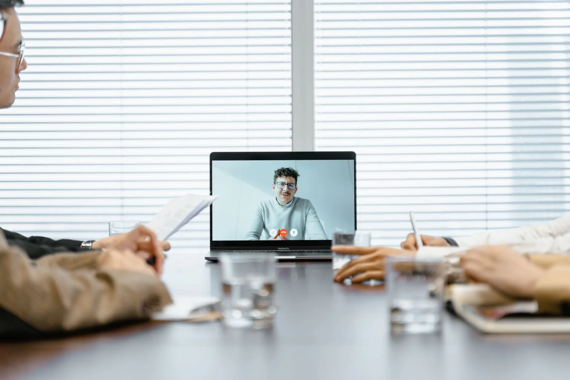 Diverse team in a virtual meeting, showing how a managed marketing service operates across channels for your business