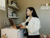 Small business owner deciding who to hire for marketing